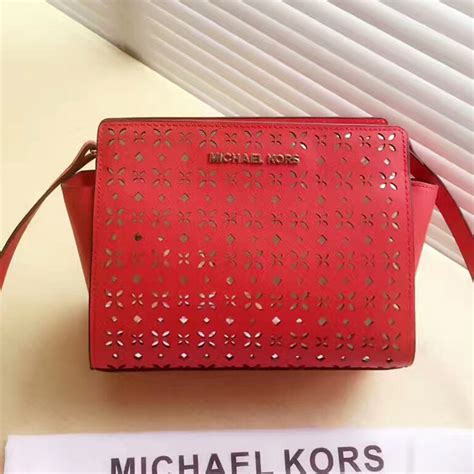 Michael Kors Selma Medium Perforated Leather Messenger In